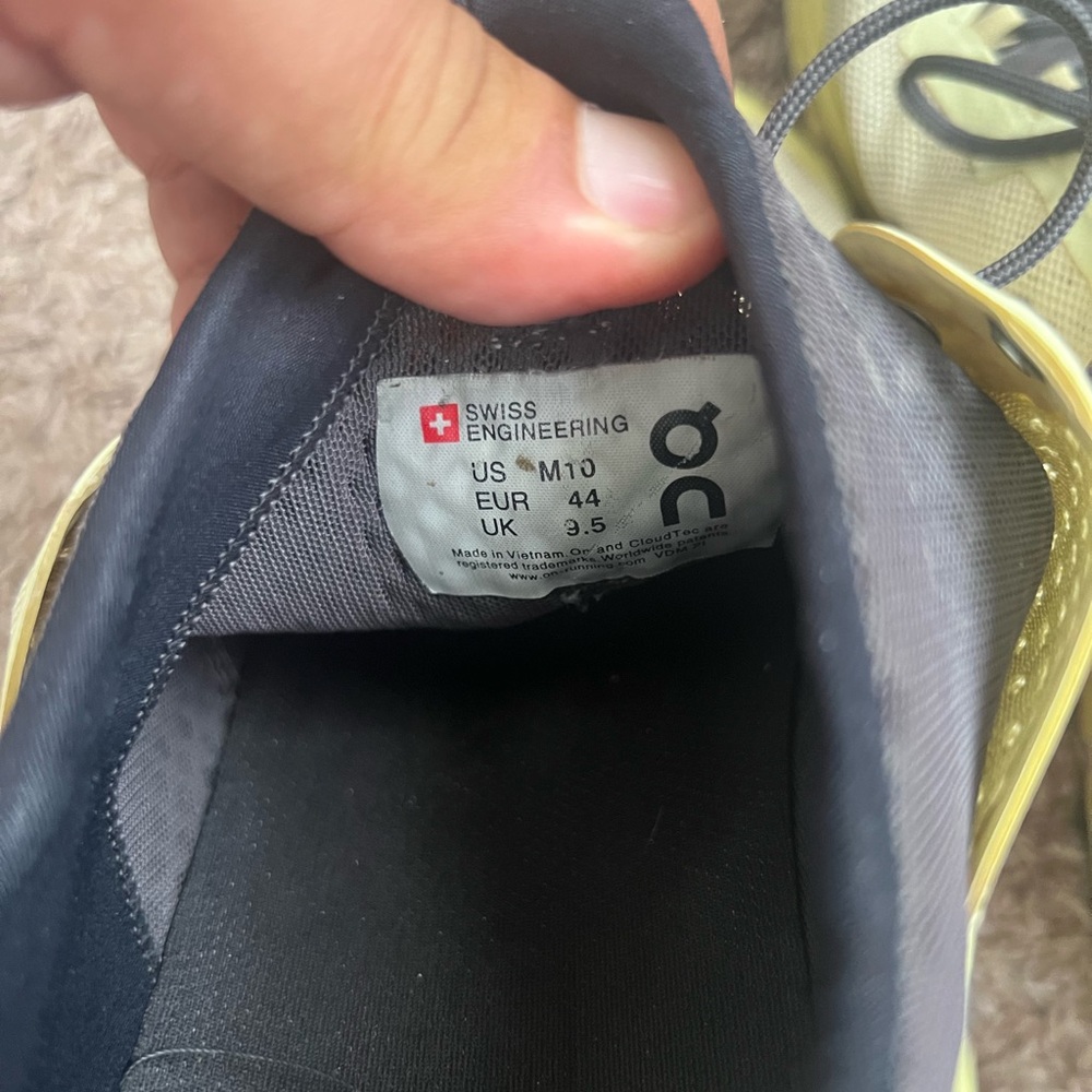 On Running Shoes with Yellow Accents